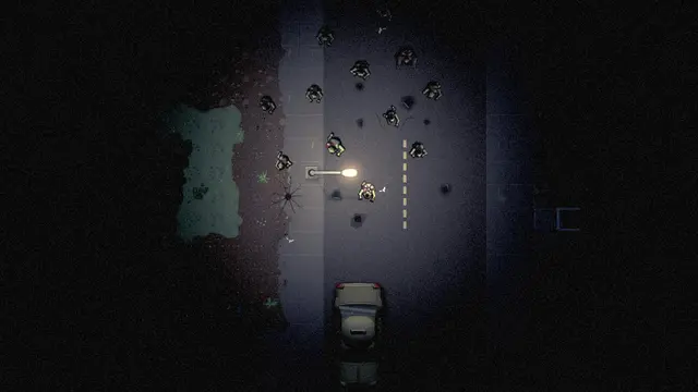 A crowd of the sick gathers around a single streetlamp at night.